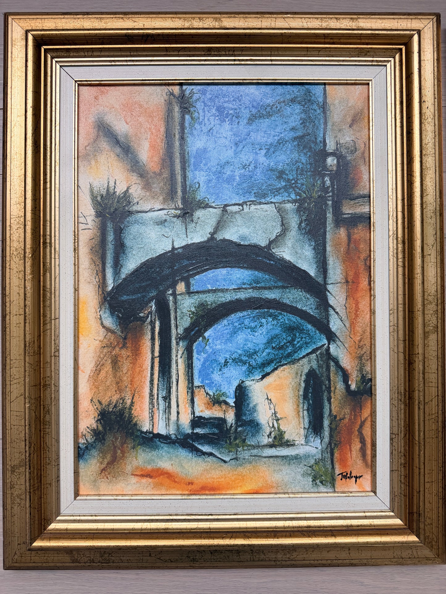 Set of two abstract oil paintings on canvas w/ gold frames.